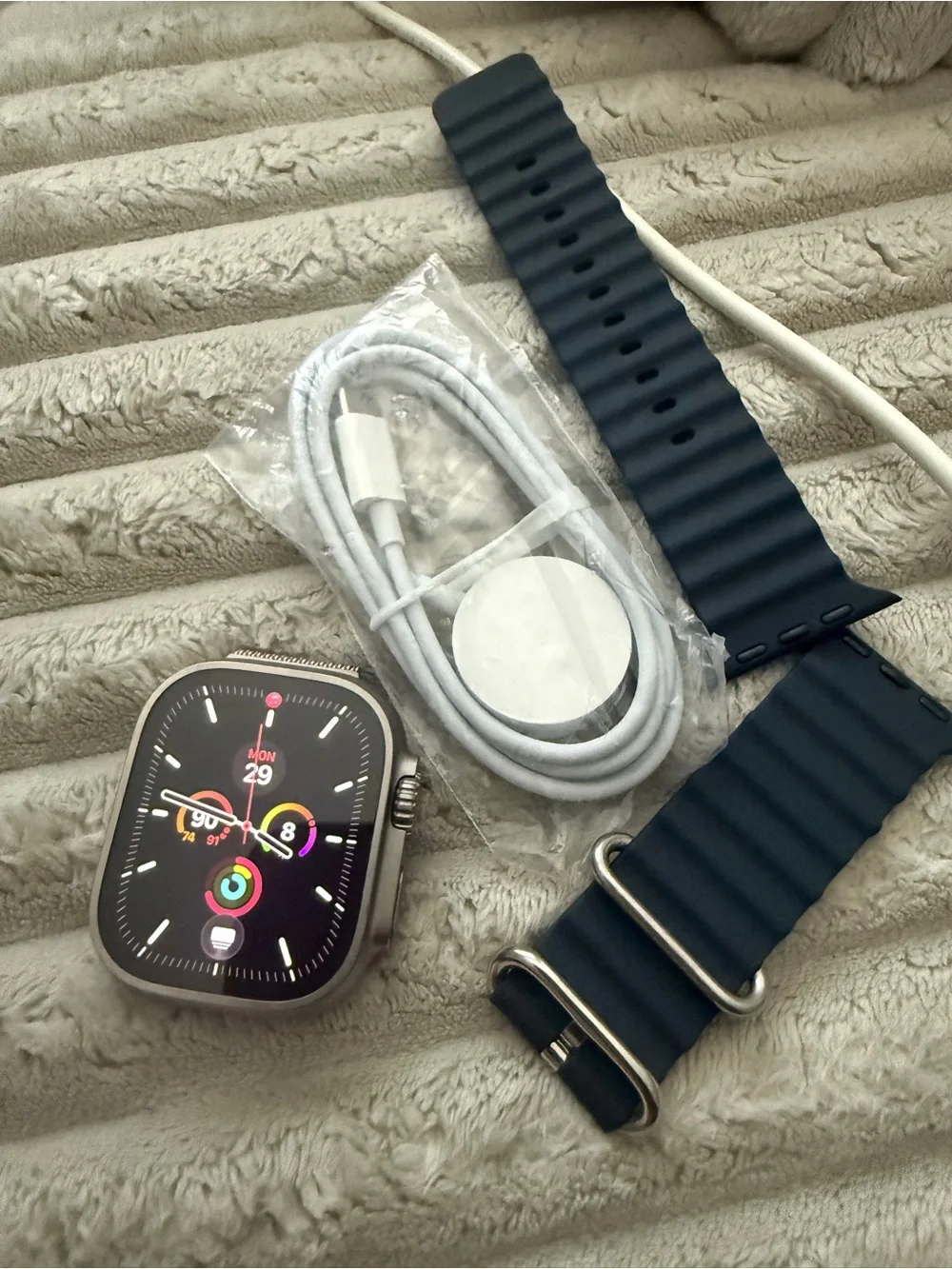 Apple Watch Ultra new - refurbishedwith Navy Silicone Strap and Magnetic Charger
